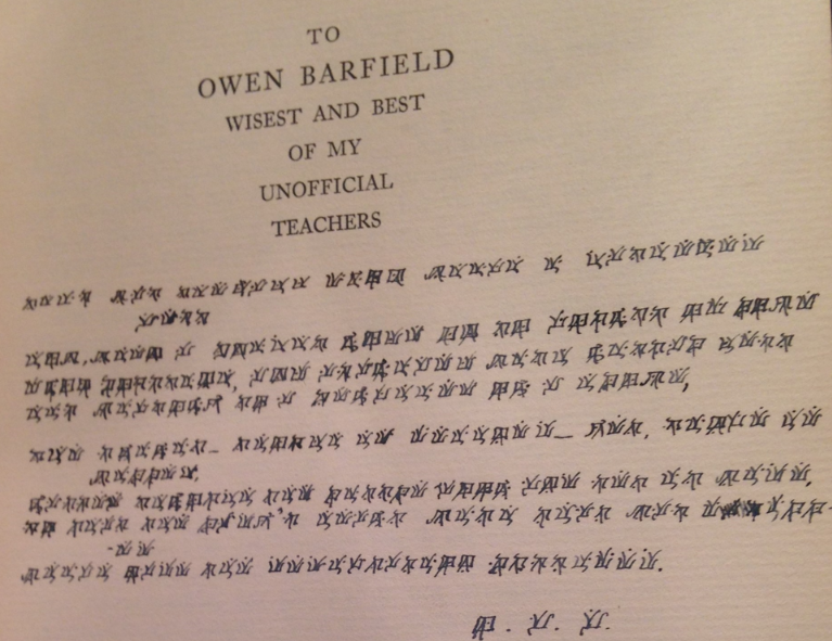 Inside of a book. Page with the printed text "To Owen Barfield Wisest and Best of my Unofficial Teachers." Under the printed text is handwritten symbols in a strange language. Symbols look as if they might be Kanji, but they are not.